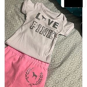 Baby onesie outfit with pants.